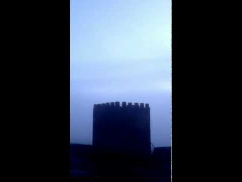 Jubilee Tower enveloped by fog.