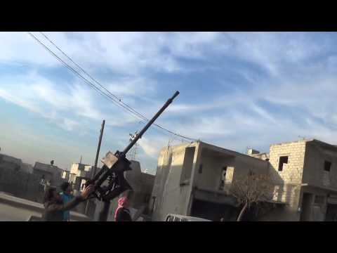 التصدي للطيران الحربي من قبل لواء التوحيد في حلفايا في ريف حماة