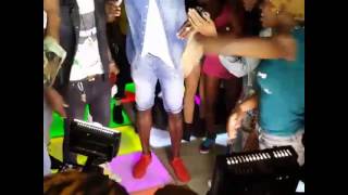 Usain Bolt dancing to alkaline song champion boy at uptown Mondays doin gabbidon new dance gimiway&quot;