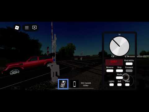 Ns 6901 leads long manifest at a crossing