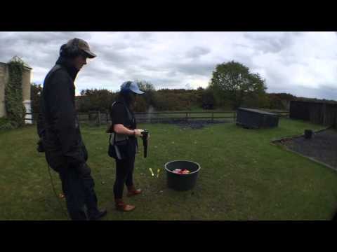 Amy get a shooting lesson from David Dale