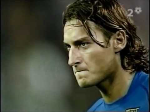 Trapattoni uses holy water before Totti freekick