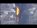 EXXONMOBIL BAYTOWN FIRE: Massive flames and black smoke fill the air