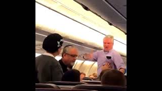 stan twitter: man on plane aggressively says "i want to shake your hand"