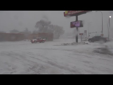 Heavy snow and strong winds hammered parts of the central U.S. on Thursday, creating hazardous travel conditions. (April 11)