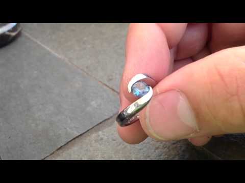 Sculpted Round Platinum Tension Set Rings