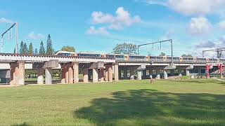 Queensland Rail unknown NGR unit works run DK44 past Leis Park into Lawnton station on Sat Mar 15.