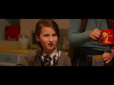 Trailer frame: the Browns with Paddington at home as strings and woodwinds soften the scene