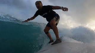 Sunset surfing in East Honolulu.