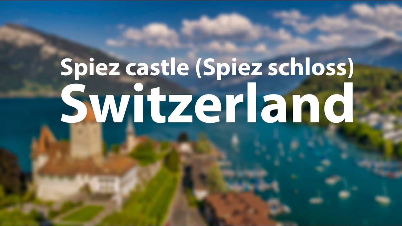Behold the captivating aerial panorama of the majestic Spiez Castle.