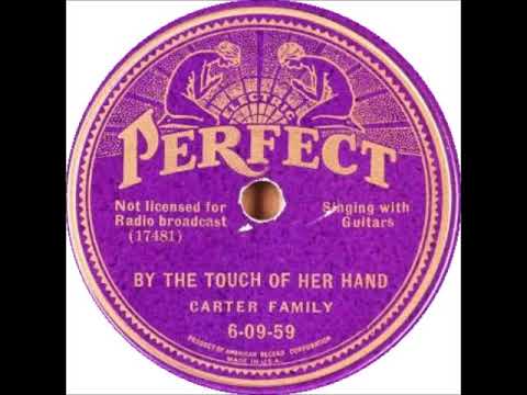 By The Touch Of Her Hand video
