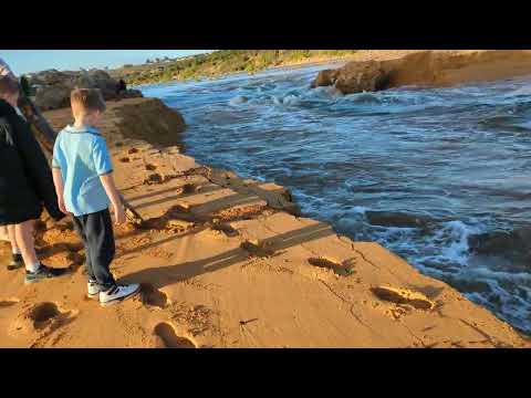 Hopkins River breached into Southern Ocean. Blocked river drains into sea in torrent