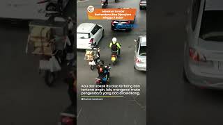 AWAS! Merokok Sembarangan Sambil Berkendara Bisa Kena Tilang dan Dipenjara Paling Lama 3 Bulan