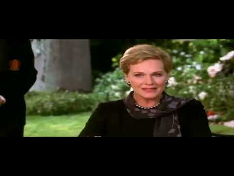 Mia and Clarisse sharing a quiet rooftop moment as a light orchestral cue plays