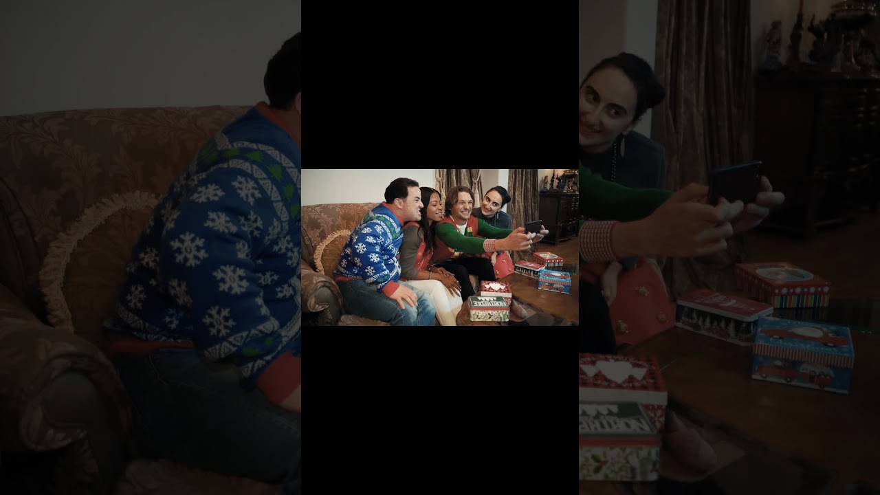 people taking a group selfie and making different poses