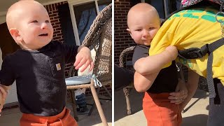 Baby brother eagerly awaits his big brothers' return from school