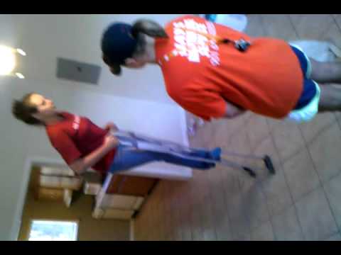 Racheal walking on crutches