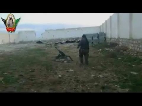 Syrian rebels fire missiles at government forces