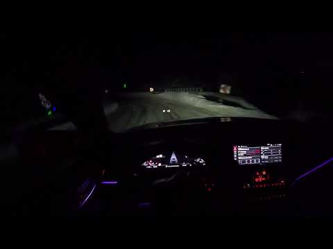 bmw M4 drift mountain road in snow