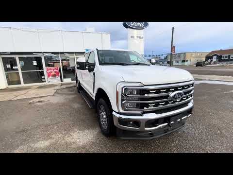 2023 Ford Super Duty F-350 SRW LARIAT 4WD Crew Cab 6.75' Box in White for sale at HomeField Ford in Raymond, AB