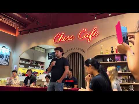 Chess GM Evgeny Romanov at Red Knight Chess Cafe in Thailand