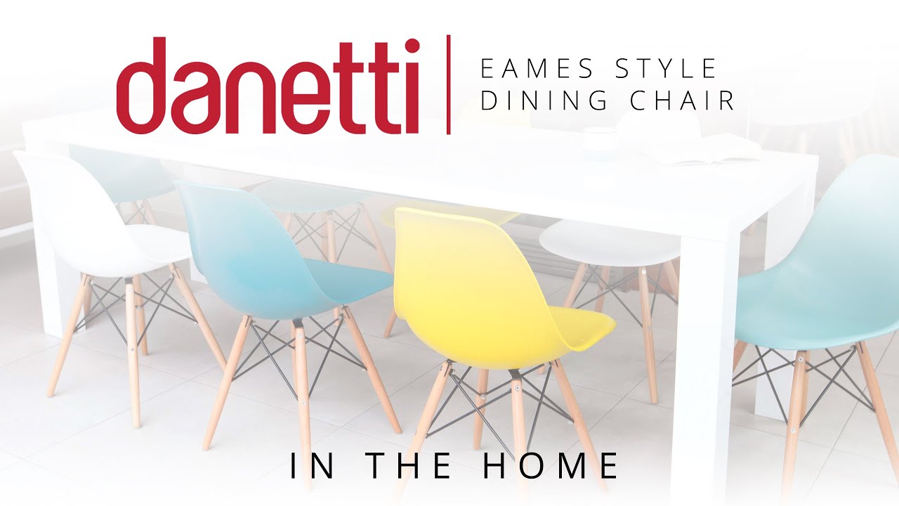 4 Seater White Round Dining Table and Eames Dining Chairs