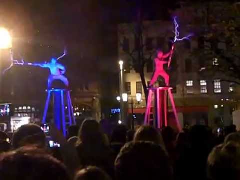 Amazing ELECTRICITY FIGHT by Two men + two Tesla coils + special suits ( HD )