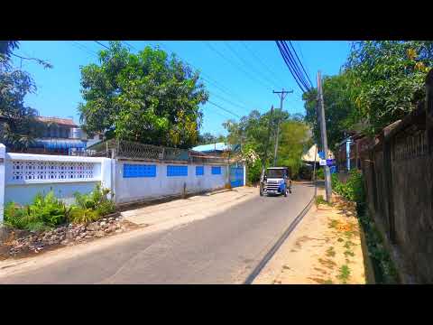 Electric Assisted Velomobile ride on a bumpy small street - 2020