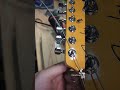 don't wrap the strings around locking tuners. do this.