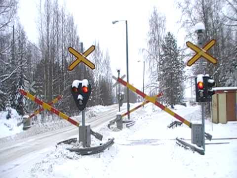 Finnish freight train 3365 passed Eerola level crossing