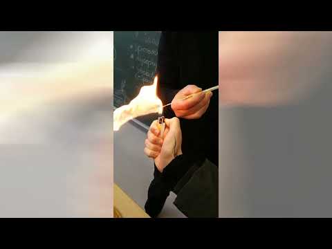 Fire spitting with spores of Lycopodium (slow motion)