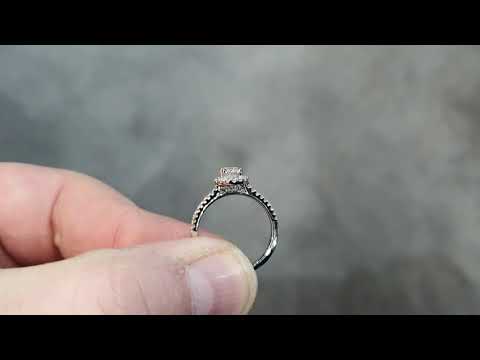 0.50ct Diamond Solitaire in a Diamond Halo Setting