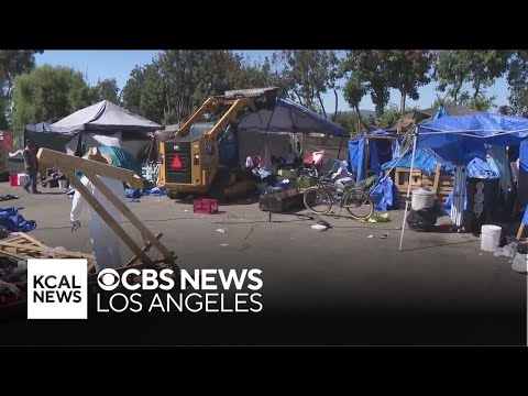 Crews clear the largest homeless encampment in the San Fernando Valley