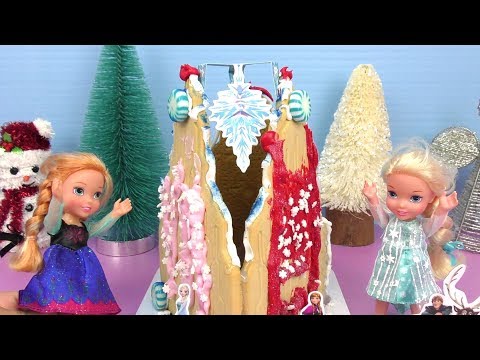 Gingerbread castle ! Elsa & Anna toddlers build a sugar cookie house