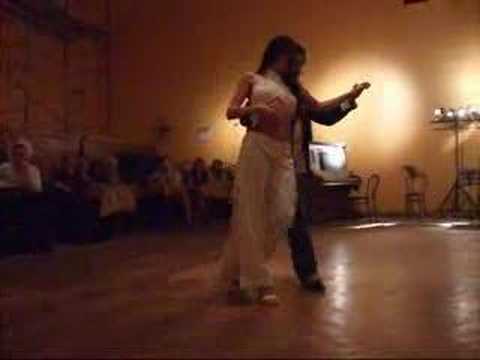  Natacha Poberaj  and  Eduardo Villegas  are  dancing  to  the  tango  "  Orlando Goñi  "