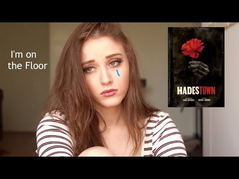 Me sitting on the floor singing Flowers from Hadestown