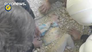 SENSITIVE: Child pulled from rubble after being buried alive, Damascus