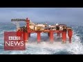 Huge Waves Crash Against Swaying North Sea Oil Rig