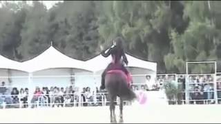 A circassian girl and her horse dancing accompanied by circassian music