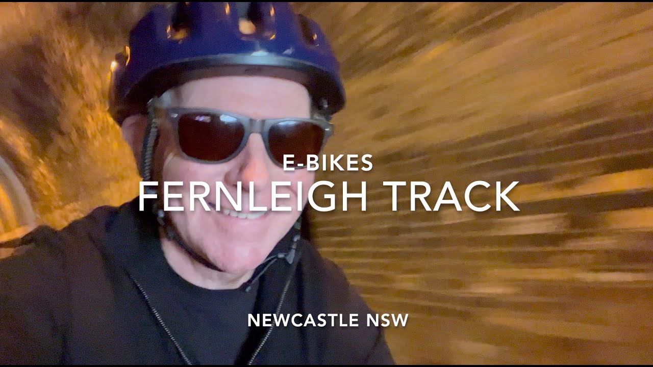 A traveler cycles through Fernleigh Track.