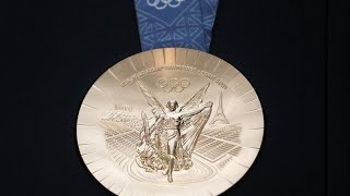 Medallas de los Juegos Olímpicos con la Torre Eiffel