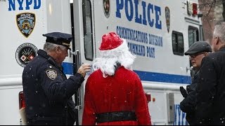 Santa Claus Pickpockets Iphones - Re-gifts Them Back