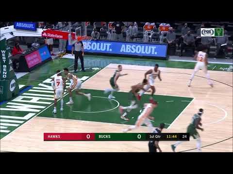 Giannis gets the ball off the tip off and just absolutely bullies the rookie in the paint