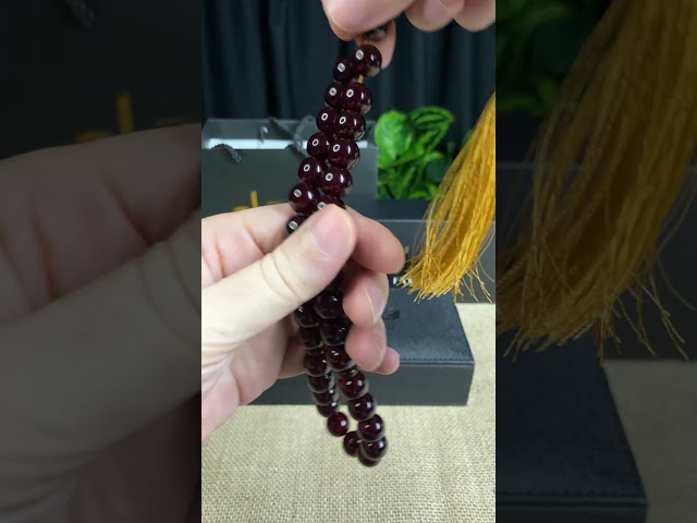 مسباح مسكي كرزي داكن – خرز دائري وكركوشة قطنية