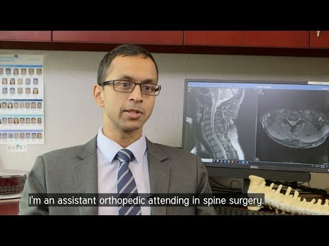 Dr. Iyer discusses his practice from his office.