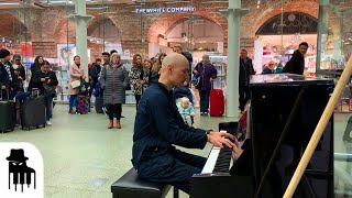 Video thumbnail of "Disguised concert pianist stuns unsuspecting travelers"
