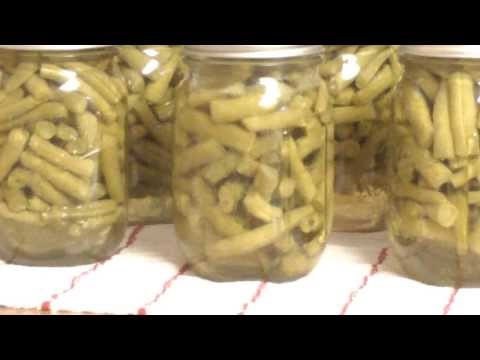 Canning green beans we bartered honey for.