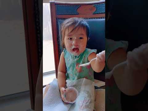 Baby Merry makes a big mess eating yogurt