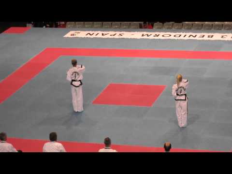 Yoo-Sin - C. Bedard vs P. Hietaniemi (FIN) - 4th dan patterns - ITF WC, Benidorm Spain