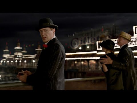 Boardwalk Empire season 3 - Nucky Thompson walks the boardwalk alone and disappears into a crowd